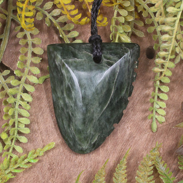 Tooth pendant carved from Kawakawa Pounamu - NZ Greenstone