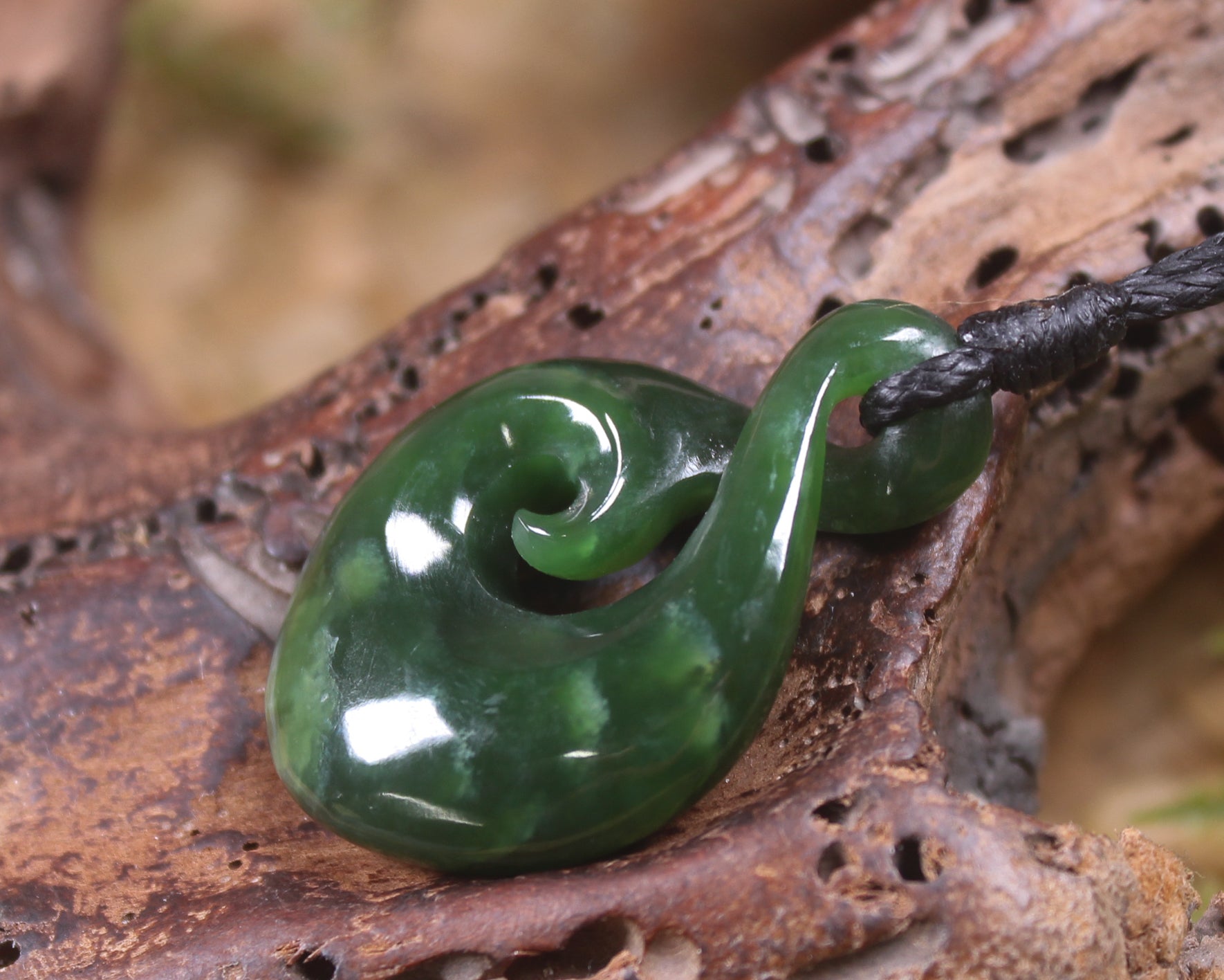 Koru Twist carved from Kawakawa Pounamu - NZ Greenstone