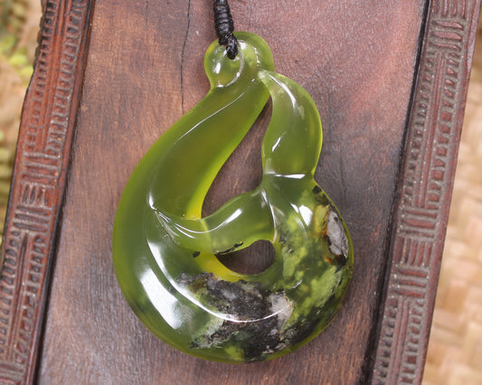 Whale tail carved from Hapopo Pounamu - NZ Greenstone