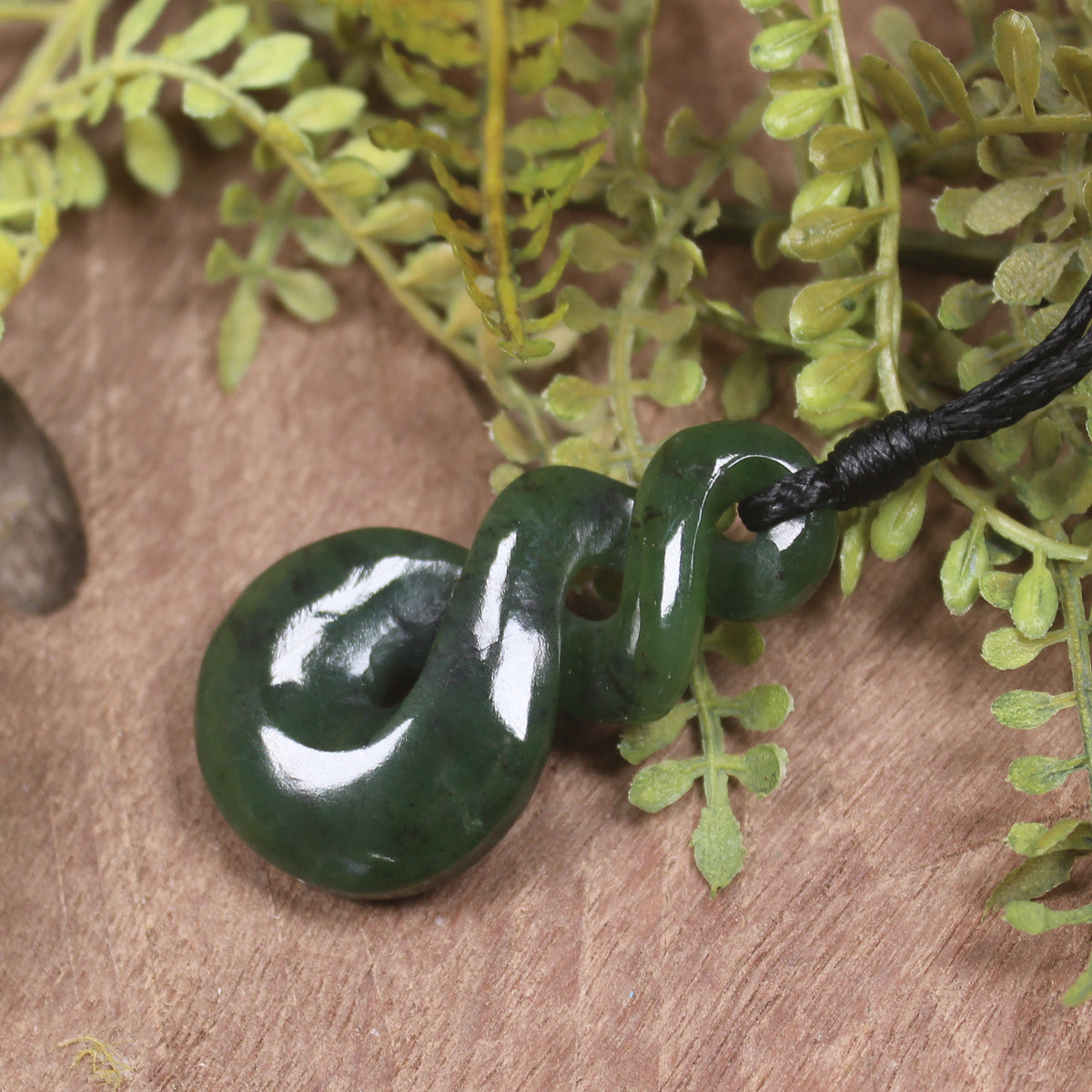 Twist carved from Kawakawa Pounamu - NZ Greenstone