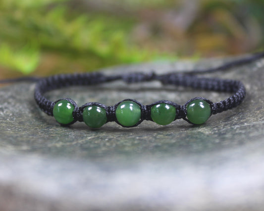 Adjustable cord bracelet with Pounamu