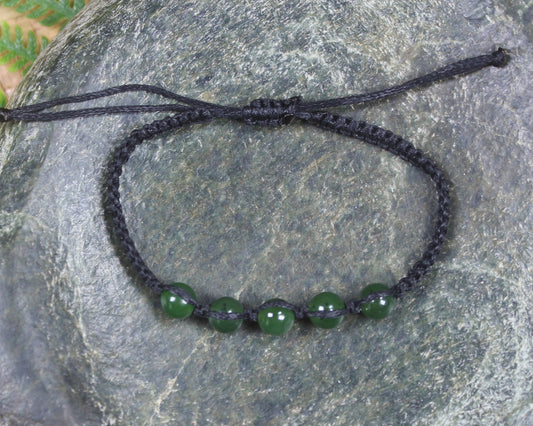 Adjustable cord bracelet with Pounamu