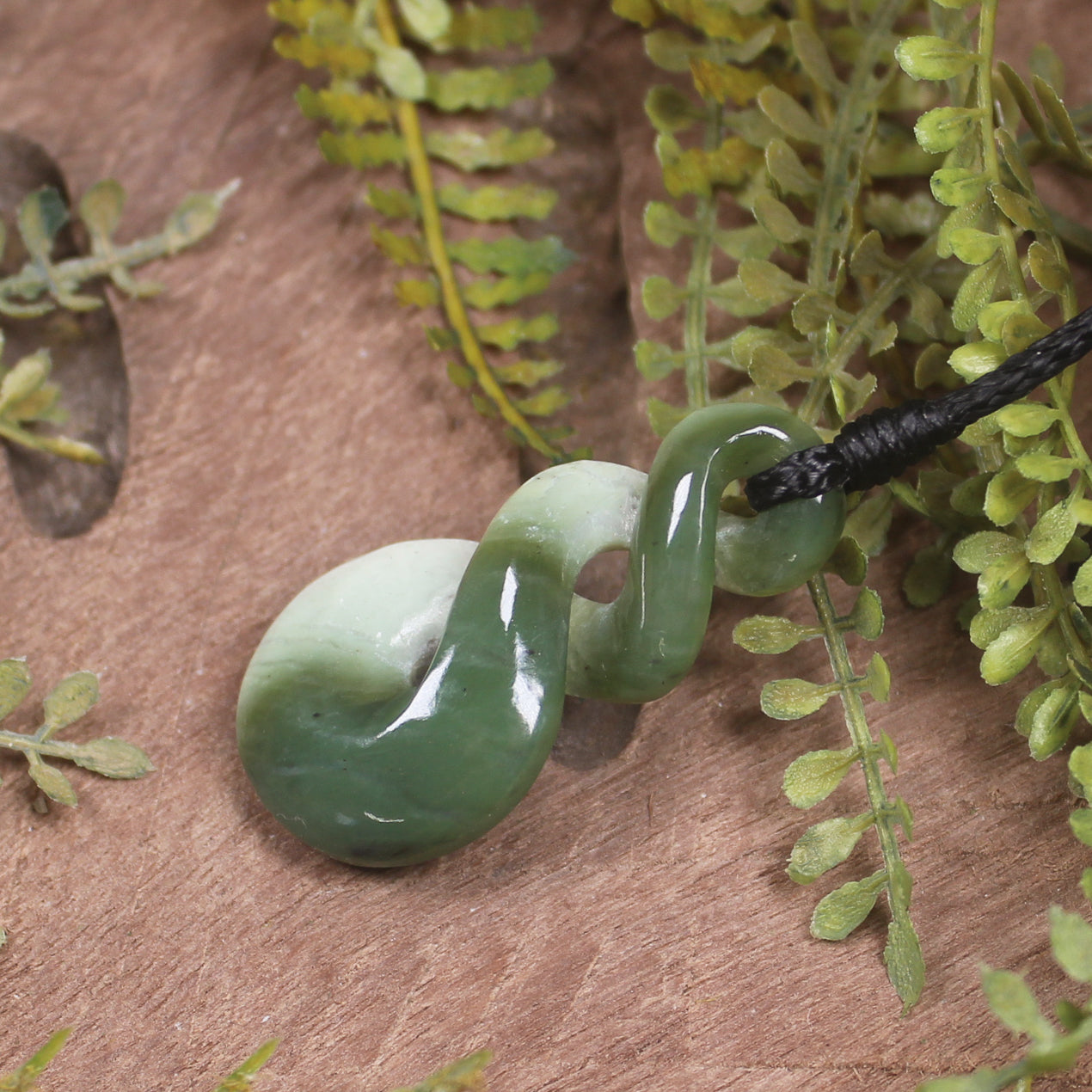 Twist or Pikorua carved from Hapopo Pounamu - NZ Greenstone