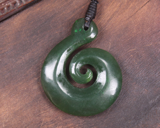Koru pendant carved from Kawakawa Pounamu - NZ Greenstone