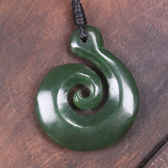 Koru pendant carved from Kawakawa Pounamu - NZ Greenstone