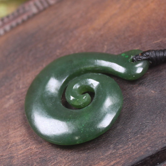 Koru pendant carved from Kawakawa Pounamu - NZ Greenstone