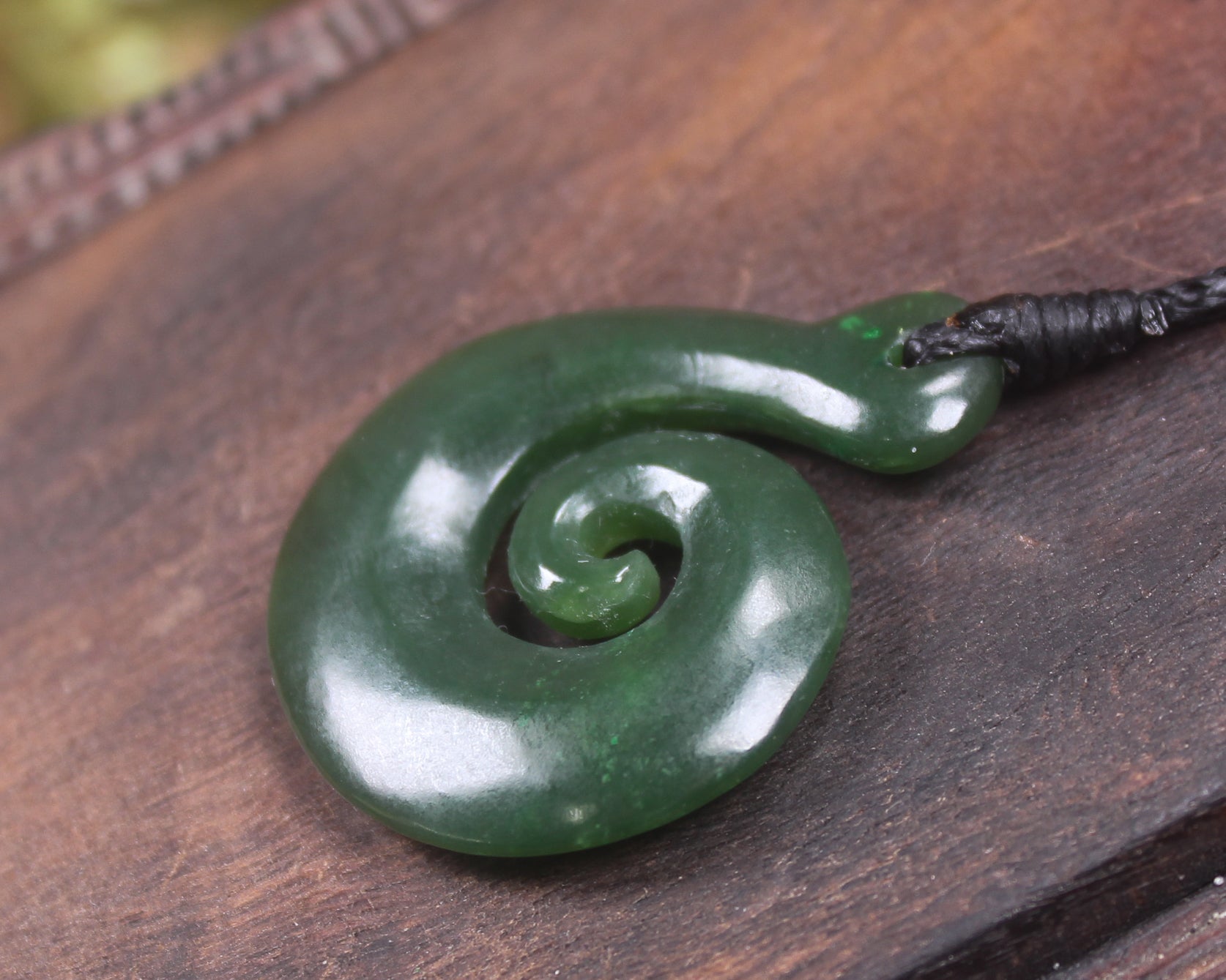 Koru pendant carved from Kawakawa Pounamu - NZ Greenstone