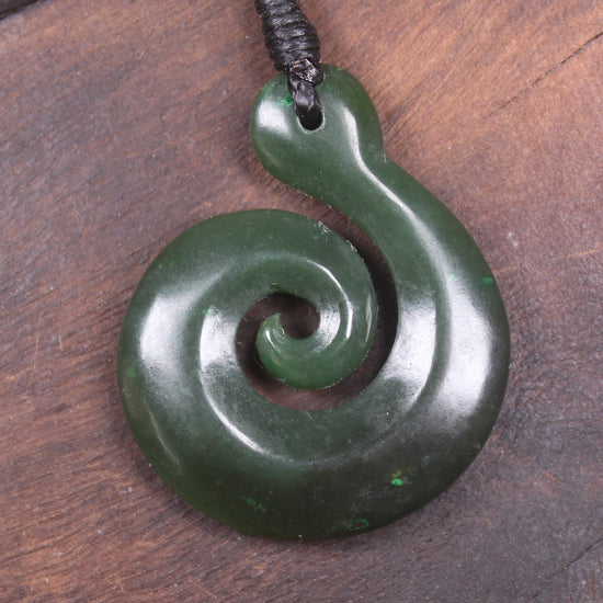 Koru pendant carved from Kawakawa Pounamu - NZ Greenstone