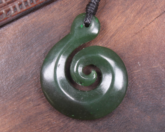 Koru pendant carved from Kawakawa Pounamu - NZ Greenstone