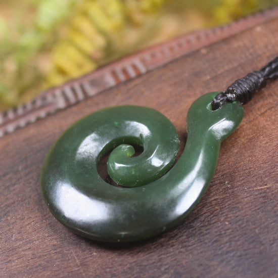 Koru pendant carved from Kawakawa Pounamu - NZ Greenstone