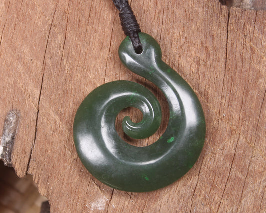 Koru pendant carved from Kawakawa Pounamu - NZ Greenstone