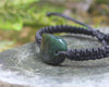 Adjustable cord bracelet with Inanga Pounamu
