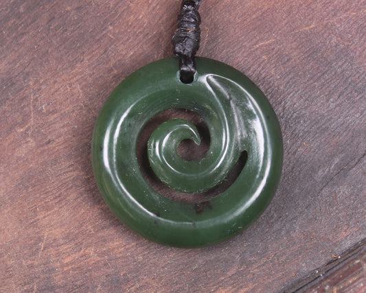 Koru pendant carved from Kawakawa Pounamu - NZ Greenstone