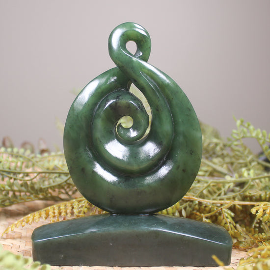 Hapopo Pounamu Koru Twist set on a Pounamu base - NZ Greenstone
