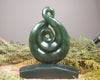 Hapopo Pounamu Koru Twist set on a Pounamu base - NZ Greenstone