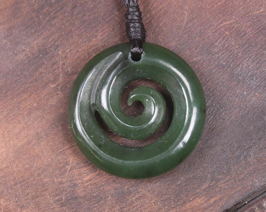 Koru pendant carved from Kawakawa Pounamu - NZ Greenstone