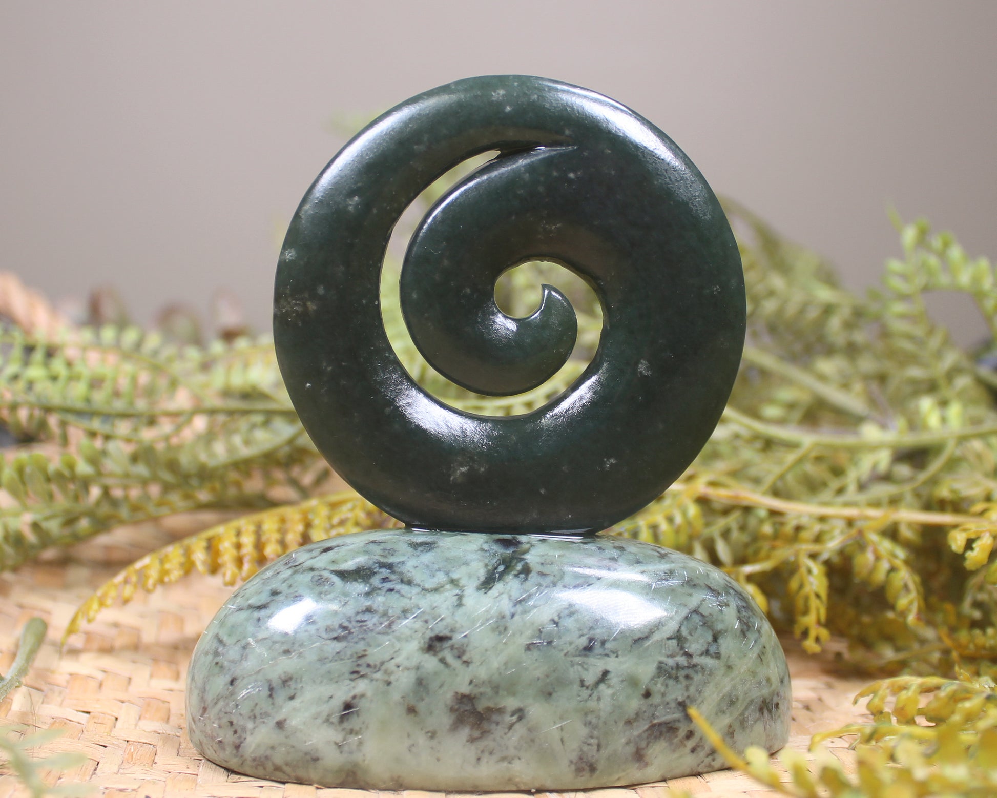 Koru sculpture carved from Rimu Pounamu - NZ Greenstone