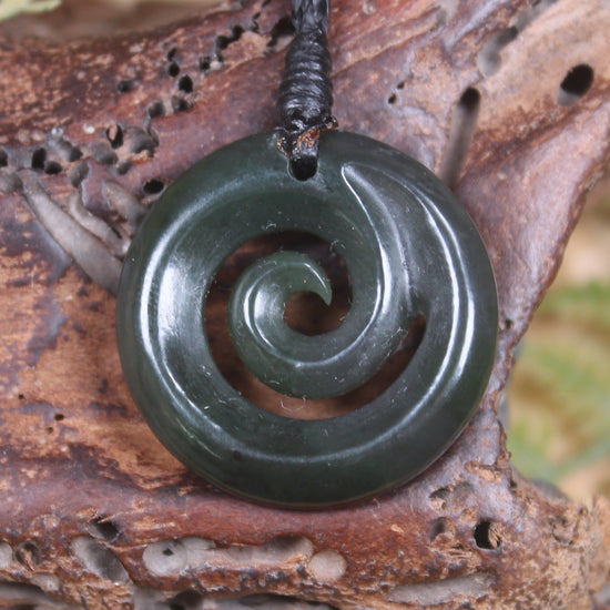 Koru pendant carved from Kawakawa Pounamu - NZ Greenstone