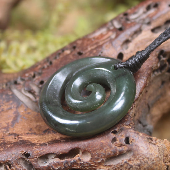 Koru pendant carved from Kawakawa Pounamu - NZ Greenstone