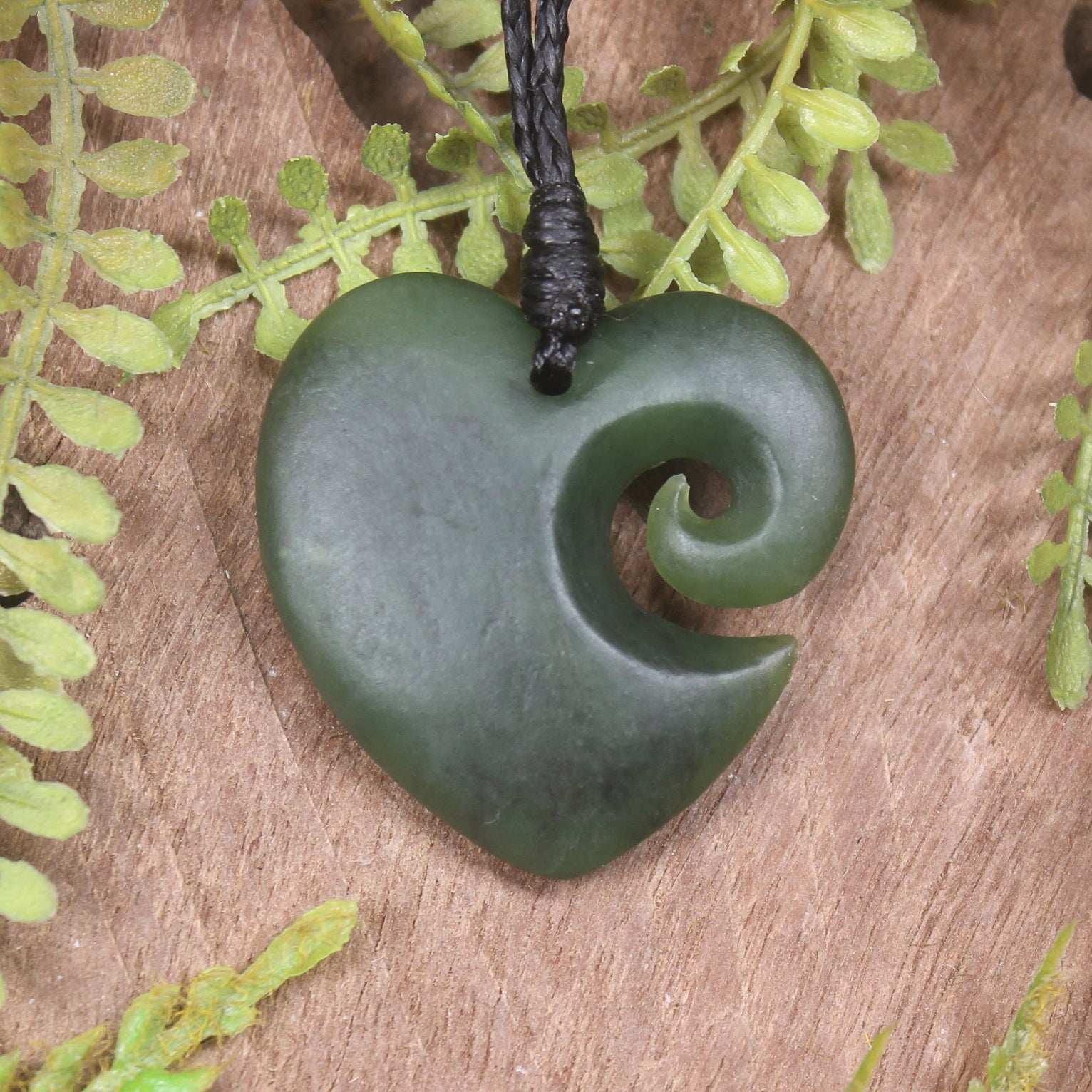 Heart with Koru carved from Hapopo Pounamu - NZ Greenstone