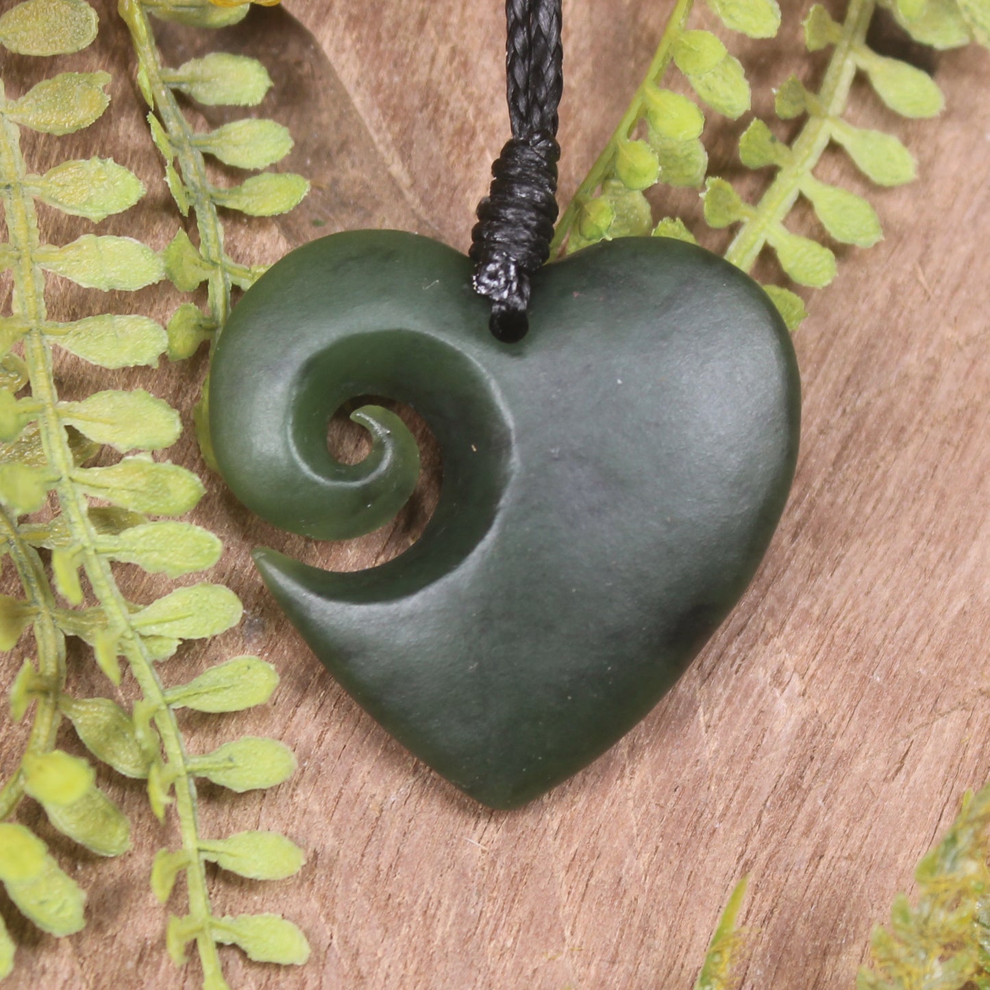 Heart with Koru carved from Kawakawa Pounamu - NZ Greenstone