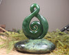 Kawakawa Pounamu Koru Twist set on a Pounamu base - NZ Greenstone