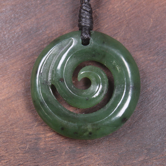 Koru pendant carved from Kawakawa Pounamu - NZ Greenstone