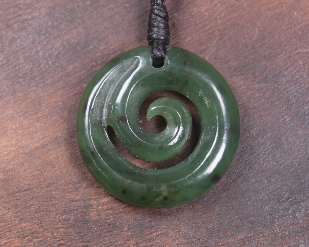 Koru pendant carved from Kawakawa Pounamu - NZ Greenstone