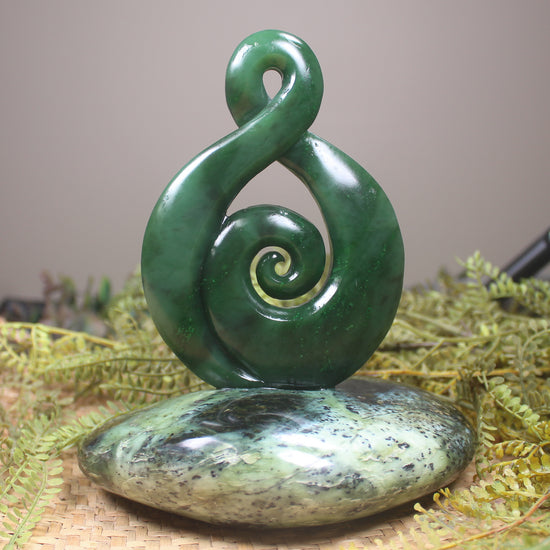 Kawakawa Pounamu Koru Twist set on a Pounamu base - NZ Greenstone