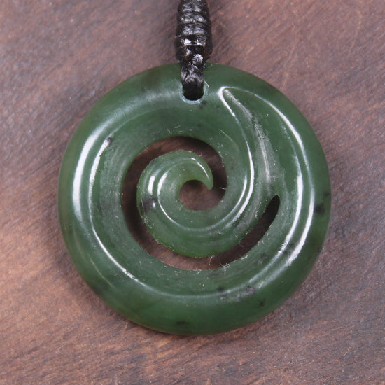 Koru pendant carved from Kawakawa Pounamu - NZ Greenstone