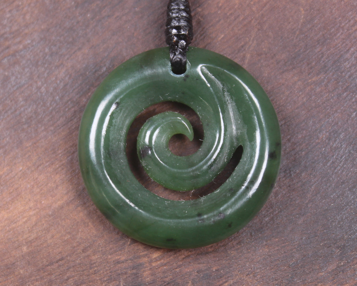 Koru pendant carved from Kawakawa Pounamu - NZ Greenstone