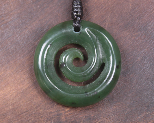 Koru pendant carved from Kawakawa Pounamu - NZ Greenstone
