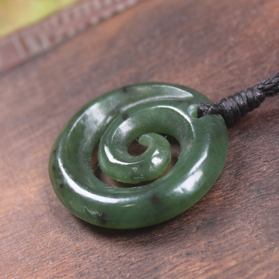 Koru pendant carved from Kawakawa Pounamu - NZ Greenstone