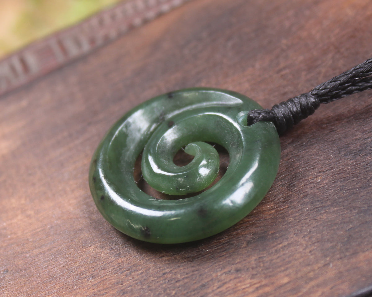 Koru pendant carved from Kawakawa Pounamu - NZ Greenstone