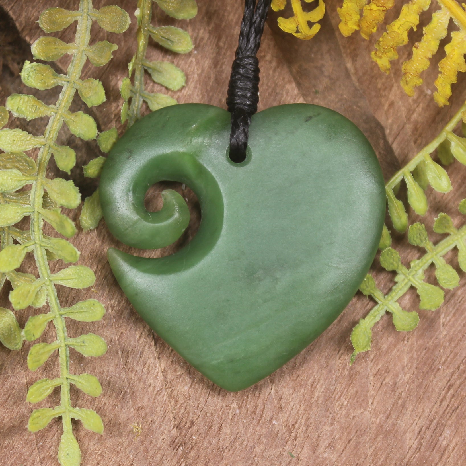 Heart with Koru carved from Hapopo Pounamu - NZ Greenstone