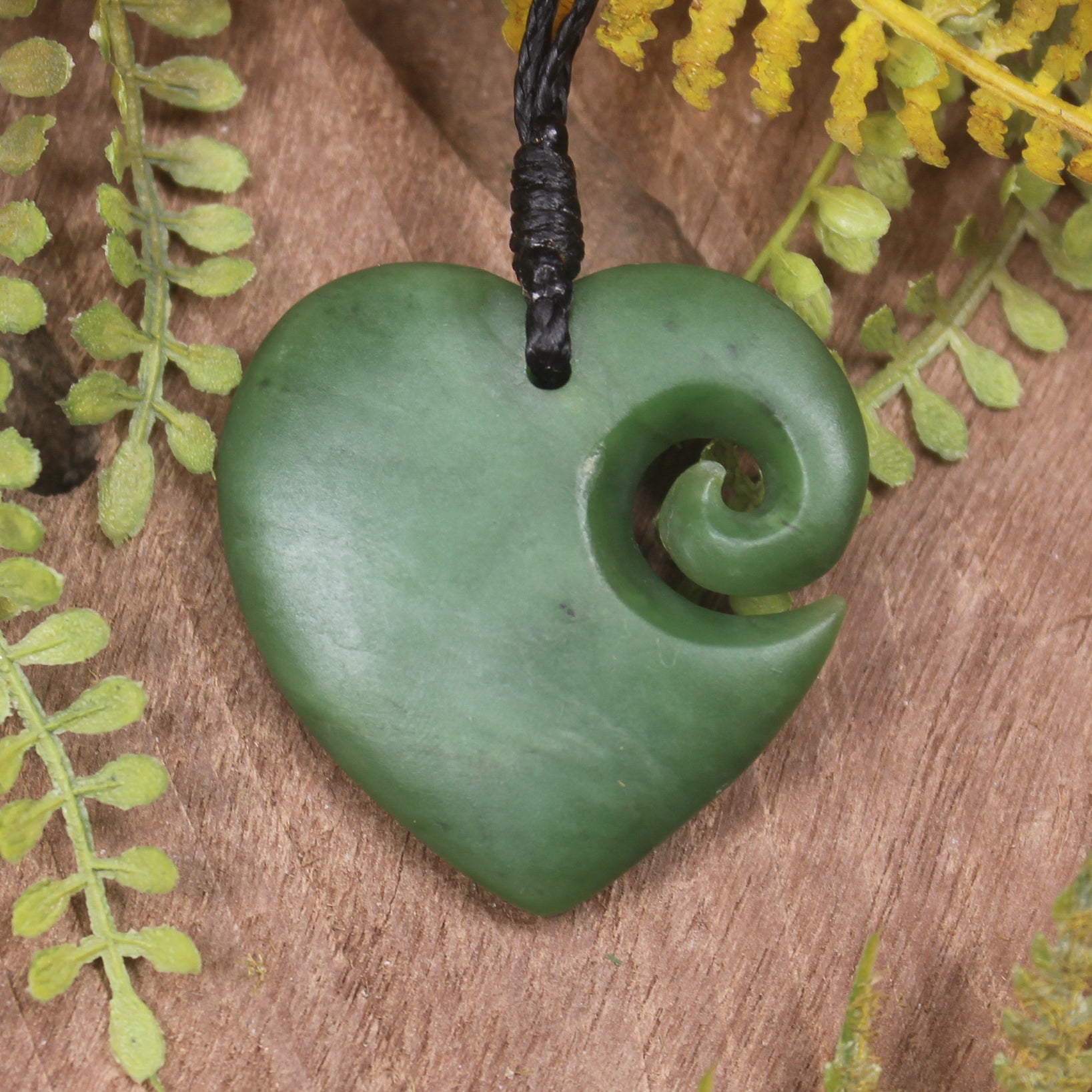Heart with Koru carved from Hapopo Pounamu - NZ Greenstone