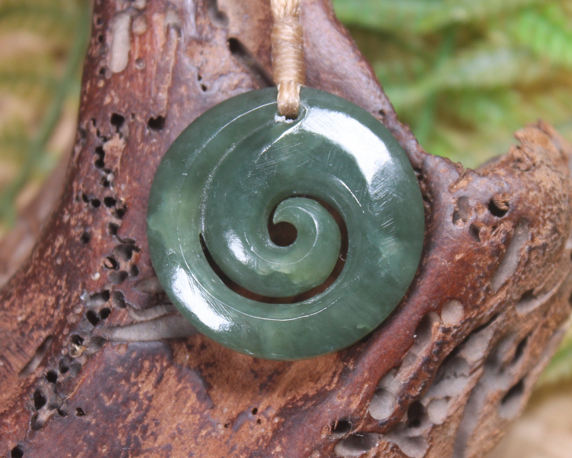 Koru carved from Inanga Pounamu - NZ Greenstone