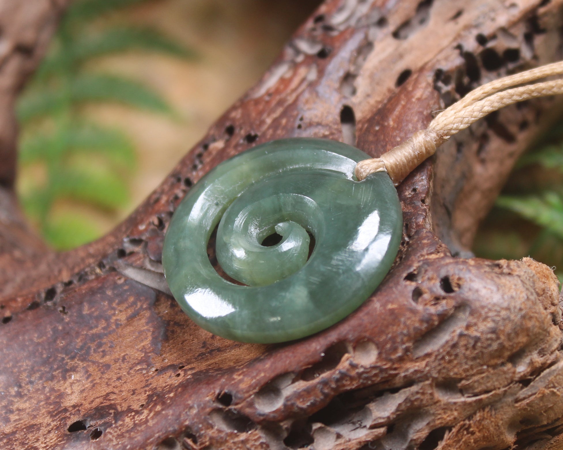 Koru carved from Inanga Pounamu - NZ Greenstone