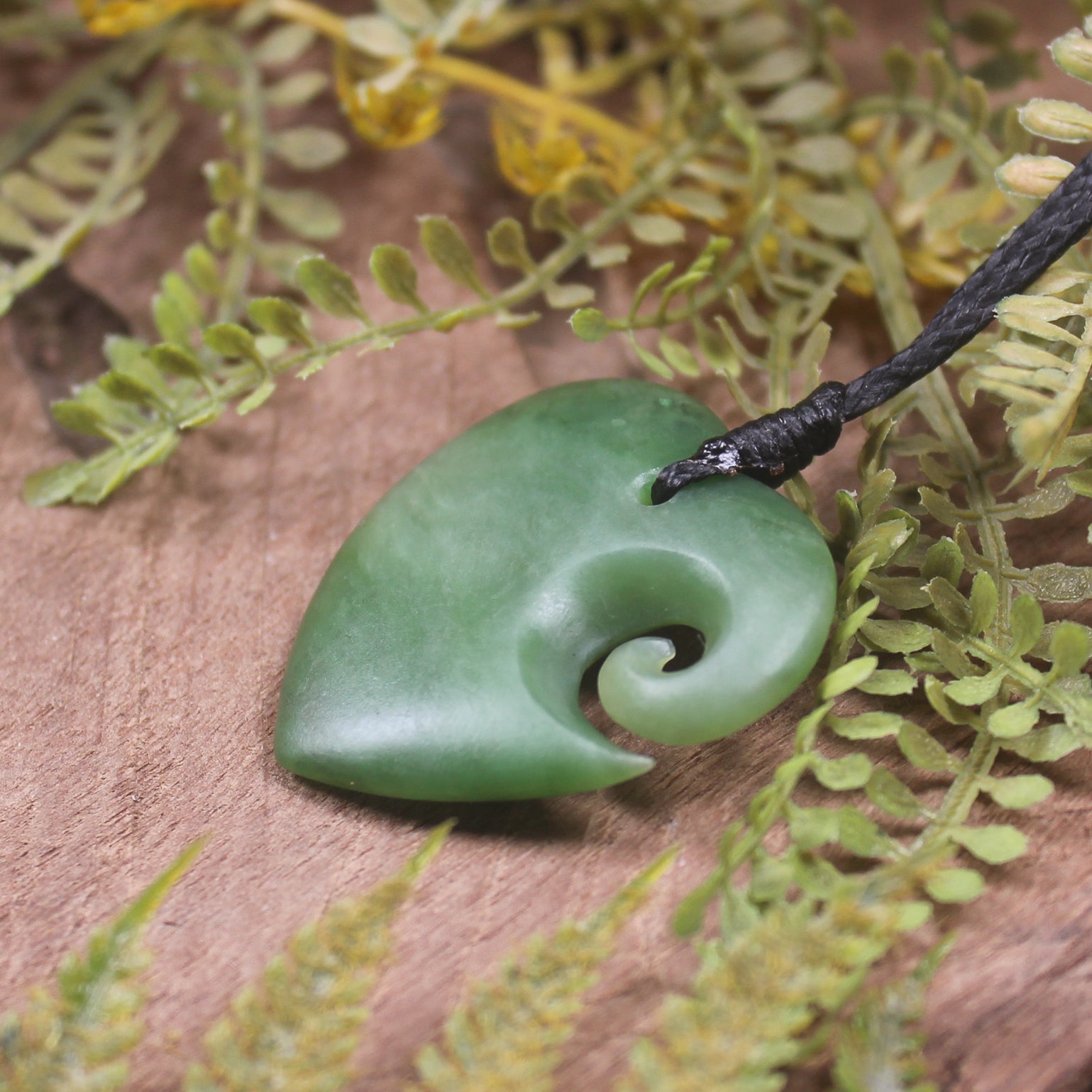 Heart with Koru carved from Hapopo Pounamu - NZ Greenstone
