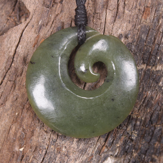 Koru carved from Rimu Pounamu - NZ Greenstone