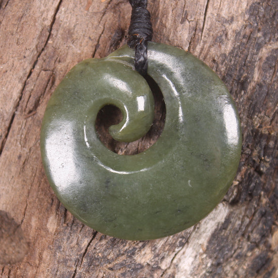 Koru carved from Rimu Pounamu - NZ Greenstone