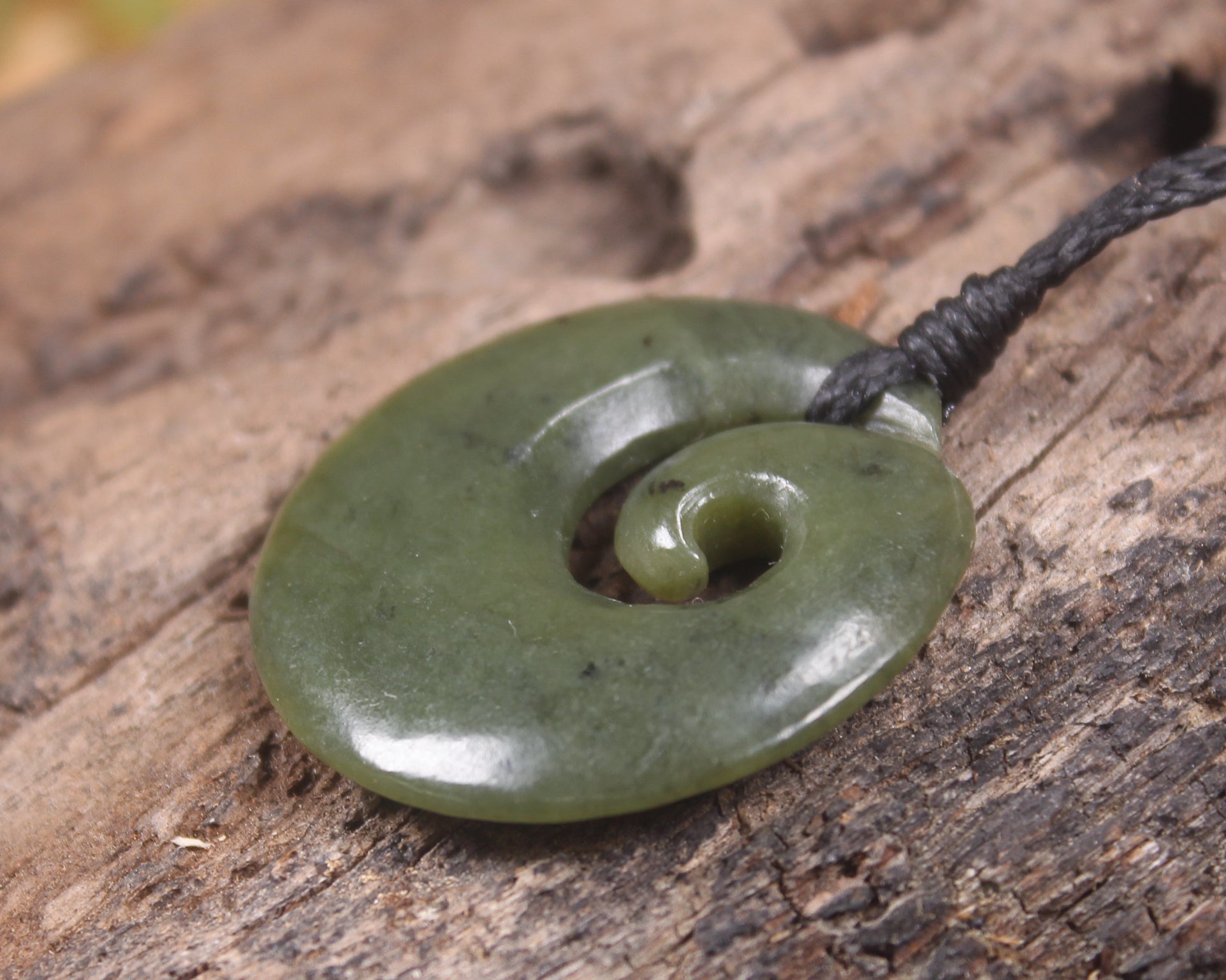 Koru carved from Rimu Pounamu - NZ Greenstone