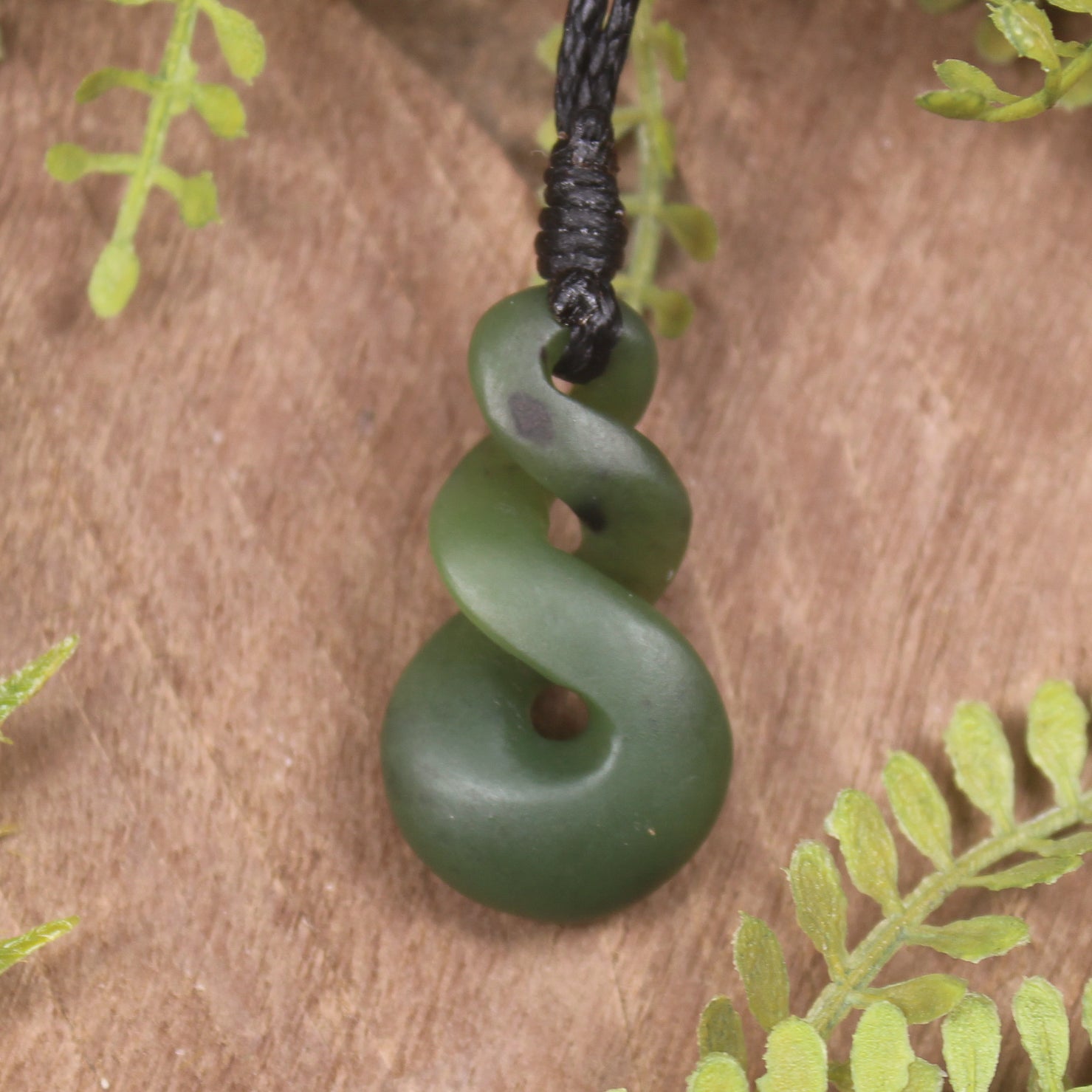Twist or Pikorua carved from Hapopo Pounamu - NZ Greenstone