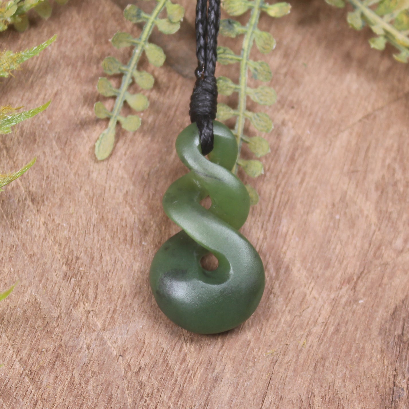 Twist or Pikorua carved from Hapopo Pounamu - NZ Greenstone