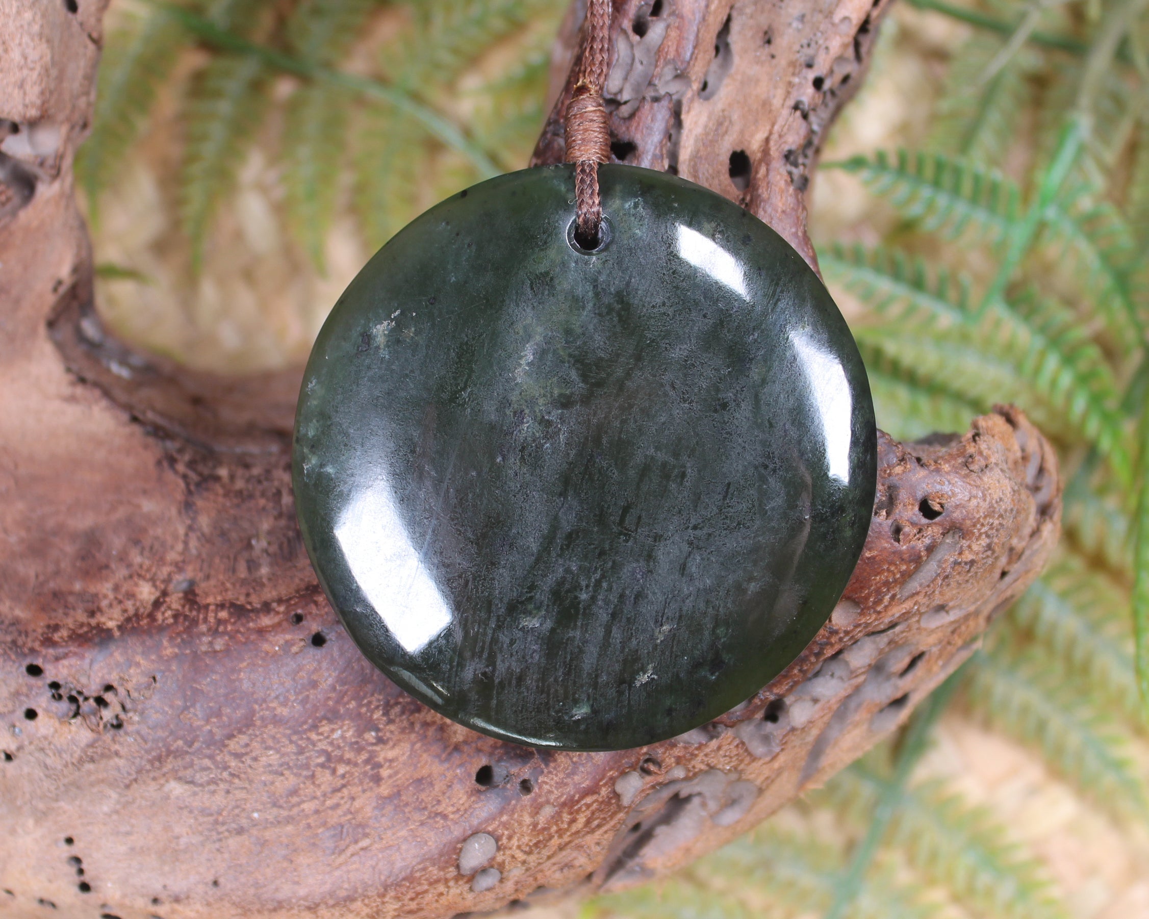 Porowhita carved from Rimu Pounamu - NZ Greenstone