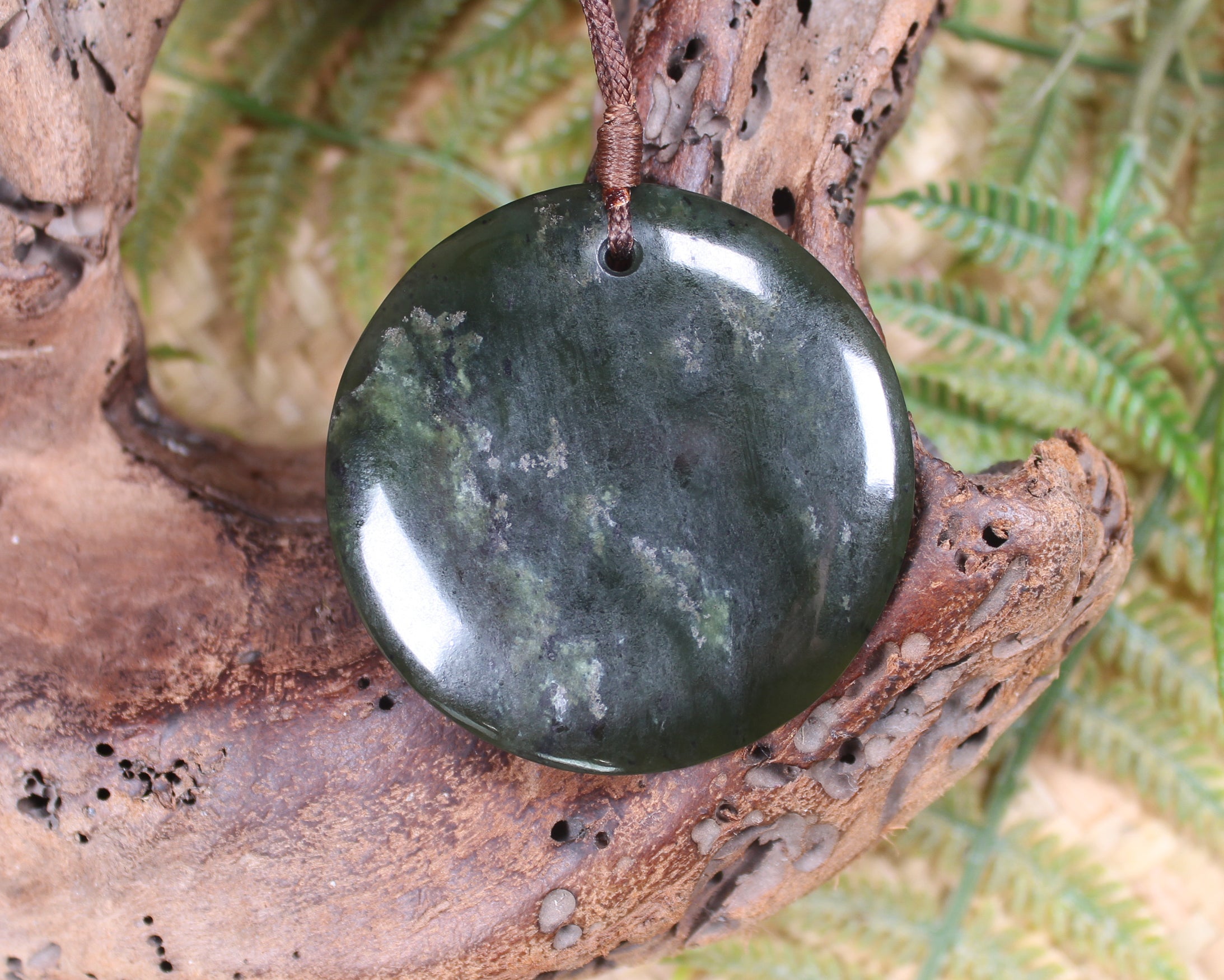 Porowhita carved from Rimu Pounamu - NZ Greenstone