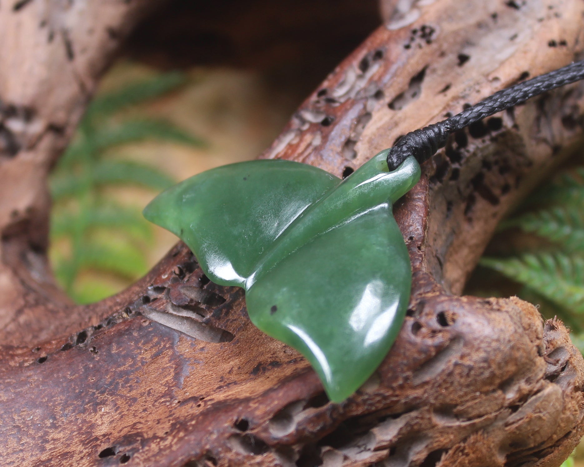 Whale tail carved from Hapopo Pounamu - NZ Greenstone