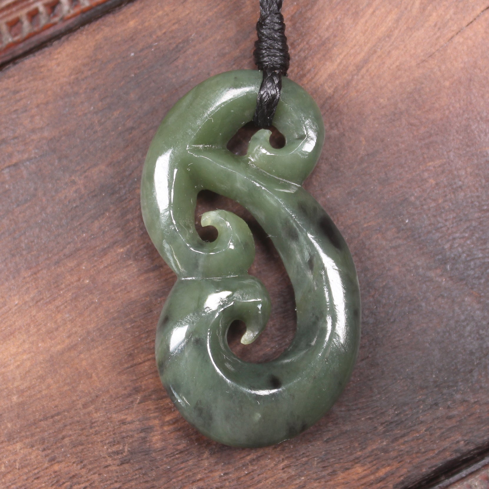 Hammerhead pendant carved from Hapopo Pounamu - NZ Greenstone