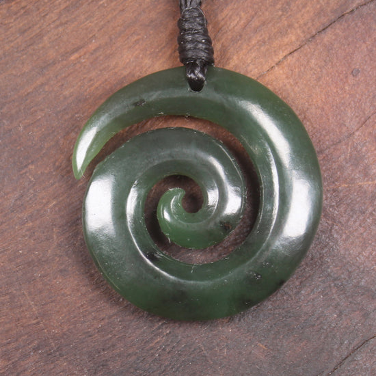 Koru pendant carved from Kawakawa Pounamu - NZ Greenstone