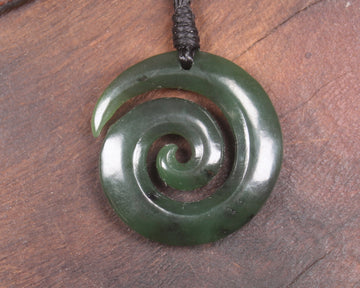 Koru pendant carved from Kawakawa Pounamu - NZ Greenstone